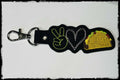 PEACE LOVE TACOS KEY CHAIN